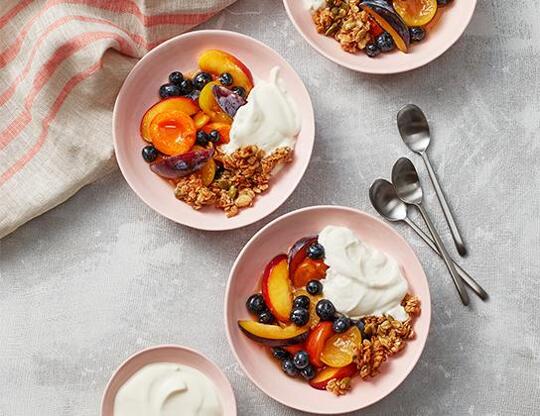 _*Fruit Salad in Honey Rosé*_ /Prepare this sophisticated yet delicious fruit salad with your favourite Ontario fruits. Sprinkle with easy skillet granola./ #CalendarRecipe #Dessert Cooking Time: 5 minutes Chilling Time: 2 hours Preparation Time: 15 minutes Ingredients: 1/4 cup (50 mL) large flake oats 2 tbsp (25 mL) chopped walnuts 2 tsp (10 mL) Ontario Honey 1 tsp (5 mL) vegetable oil 1/4 tsp (1 mL) vanilla Pinch ground cinnamon 1 tbsp (15 mL) pumpkin or sunflower seeds Salad: 1/2 cup (125 mL) VQA Ontario Rosé Wine 2 tbsp (25 mL) Ontario Honey (or to taste) 1 tbsp (15 mL) thawed frozen orange juice concentrate 4 cups (1 L) whole, sliced or halved seasonal Ontario Fruits, such as Apricots, Blueberries, Coronation Grapes, Nectarines, Peaches, Plums and Raspberries 1 cup (250 mL) 35% Ontario Whipping Cream 1 tbsp (15 mL) icing sugar 1 tsp (5 mL) vanilla Instructions: *1.* In small nonstick skillet, combine oats, walnuts, honey, oil, vanilla and cinnamon; cook, over medium heat, stirring often until golden, about 5 minutes. Stir in pumpkin seeds; transfer to small bowl to cool. *2.* Salad: In large bowl, whisk wine, honey and orange juice to combine. Add fruit; gently toss. Cover; refrigerate until chilled, about 2 hours. *3.* In large bowl, using electric mixer, on high speed, beat cream until it begins to thicken. Add icing sugar and vanilla; beat until soft peaks. *4.* To serve, spoon granola, fruit and wine mixture into bowls. Top with whipped cream.