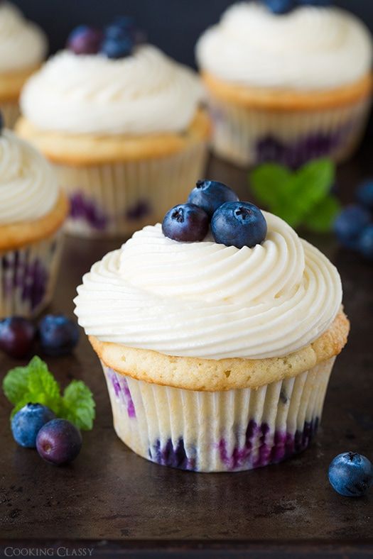_*Blueberry Cupcakes with Cream Cheese Frosting*_ /These are utterly divine! Heaven in cupcake form. You will want to savor each and every bite./ #BlueberryCupcakesCupcakes #CakeCupcakes #Desserts #Blueberries #Butter #Buttermilk #CakeFlour #CreamCheese #EggWhites #Eggs #PowderedSugar #SourCream #Sugar #VanillaExtract Prep: 30 minutes. Cook: 20 minutes. Ready in: 2 hours. INGREDIENTS: 1: 1 2/3 cup cake flour. 2: 3/4 tsp baking powder. 3: 1/4 tsp baking soda. 4: 1/2 tsp salt. 5: 3/4 cup + 2 Tbsp granulated sugar. 6: 1/2 cup unsalted butter , softened*. 7: 1 large egg. 8: 2 large egg whites. 9: 1 tsp vanilla extract. 10: 1/4 cup buttermilk. 11: 1/3 cup sour cream. 12: 1 1/4 cups fresh blueberries , plus more for topping. 13: 8 oz cream cheese , softened. 14: 1/2 cup butter , softened (I prefer 1/4 cup unsalted and 1/4 cup salted). 15: 1/2 tsp vanilla extract. 16: 2 cups powdered sugar. INSTRUCTIONS: 1: Preheat oven to 350 degrees. Sift cake flour into a mixing bowl, add baking powder, baking soda and salt and whisk 20 seconds, set aside. 2: In the bowl of an electric stand mixer fitted with the paddle attachment, whip butter and granulated sugar until pale and fluffy. Scrape down bowl. Mix in egg, then mix in egg whites one at a time. Blend in vanilla. 3: In the liquid measuring cup used to measure buttermilk, whisk together sour cream with buttermilk until smooth. Working in three separate batches, beginning and ending with flour mixture, add 1/3 of the flour mixture alternating with 1/2 of the buttermilk mixture and mixing just until combined after each addition. Gently fold in blueberries. 4: Divide batter among 12 paper lined muffin cups, filling each about 3/4 full (about 1/3 cup batter in each). 5: Bake in preheated oven 20 - 24 minutes until toothpick inserted into center comes out clean. Allow to cool in muffin tin several minutes, then transfer to a wire rack to cool completely. Once cool, pipe or spread cream cheese frosting over tops and garnish with blueberries. 6: For the Cream Cheese Frosting:. 7: In the bowl of an electric stand mixer fitted with the paddle attachment (I recommend using a beater blade), whip cream cheese and butter until smooth and fluffy. Mix in vanilla, then stir in powdered sugar and continue to whip until smooth and fluffy (if it seems slightly runny, chill then stir before piping or spreading). Notes: *If you only have salted butter that will be fine for this recipe, simply reduce the salt to 1/4 tsp. Also, when softening your butter, you can either leave it out to nearly reach room temp, or you can heat it in the microwave, rotating it about every 4 seconds until soft (so it softens evenly). Just don't let it melt.