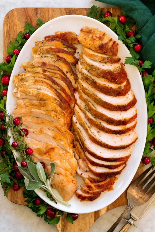 _*Crockpot Turkey Breast*_ /Crockpot Turkey Breast is the easiest way to cook turkey! This foolproof slow cooker method frees up oven space and yields tender, juicy turkey breast. Perfect for a holiday feast yet it’s simple enough for a weeknight dinner (plus leftovers make the best sandwiches)./   #Butter #Carrots #Celery #ChickenBroth #GarlicPowder #Onions #Paprika #Rosemary #Thyme #Turkey  Servings: 8 Ready in: 6 hours 15 minutes Prep: 15 minutes Cook: 6 hours  Ingredients:  6 lb bone-in turkey breast (whole with two breasts), thaw completely beforehand if frozen* 1/4 cup butter, softened 1 tsp dried thyme 1 tsp dried rosemary 1 tsp garlic powder Salt and ground black pepper 1 medium onion, halved and peeled 1 large carrot, peeled and cut into 2-inch chunks 1 large celery rib, cut into 2-inch chunks 1 garlic clove, smashed 1 tsp paprika 1 cup low-sodium chicken broth Turkey Gravy 1/4 cup butter 2 Tbsp turkey drippings (or more butter)  Instructions: *1.* In a small mixing bowl mix together 1/4 cup butter, thyme, rosemary, garlic powder and season with salt and pepper.  *2.* Separate the skin from the turkey breast (enter near the neck) using the back of a wooden spoon. Be careful not to tear through the opposite end so the butter doesn't run out.  *3.* Rub butter under the skin and spread out by rubbing over the top of the skin.  *4.* Place onions, carrots, celery, and garlic clove in slow cooker. Pour in chicken broth. Place turkey breast over (use the veggies to help prop it up and also to keep it from touching the sides of the slow cooker).  *5.* Sprinkle over paprika and season with salt and pepper.  *6.* Cover and cook on low heat just until center of thickest portion registers 160 degrees on an instant read food thermometer, about 5 to 6 hours. If desired you can broil on a baking sheet for about 2 - 3 minutes for a golden brown skin.  *7.* Let turkey breast rest 10 minutes before carving.  *8.* Drain the broth through a fine strainer into a liquid measuring cup. There should be about 2 1/2 cups. Skim off 2 Tbsp of the fat from the top and add to a saucepan (don't add any liquid or it will clump the gravy). Then add more chicken broth as needed to equal 3 cups in liquid measuring cup.  *9.* Meanwhile in a medium saucepan melt 1/4 cup butter with the fat over medium heat. Add flour and whisk and cook 1 to 2 minutes. While whisking pour in turkey broth/chicken broth mixture, season with salt and pepper to taste.  *10.* Cook and whisk until thickened. Serve over sliced turkey.   Notes: *If frozen plan on two full days of thawing in the fridge before cooking.