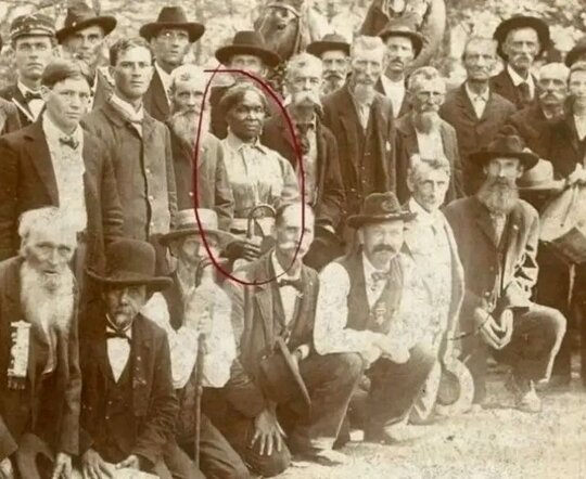The woman circled in red is Lucy Higgs Nichols, a remarkable figure whose life story speaks to resilience and dedication. Born into slavery in Tennessee, she escaped during the Civil War and found refuge with the 23rd Indiana Infantry Regiment nearby. She stayed with them, serving as a nurse throughout the conflict, caring for soldiers amid the hardships of war.

After the war ended, Lucy moved north with the regiment, settling in Indiana and working alongside veterans of the 23rd. When Congress passed the Army Nurses Pension Act of 1892, allowing Civil War nurses to claim pensions, Lucy applied. However, the War Department had no record of her service and initially denied her pension.

In an extraordinary show of support, fifty-five surviving veterans of the 23rd petitioned Congress on her behalf, insisting she deserved this recognition. Their efforts succeeded, and Lucy was granted her pension. The photograph captures Nichols alongside her fellow veterans at a reunion in 1898, a testament to the bond they shared.

Lucy Higgs Nichols passed away in 1915 and rests in a cemetery in New Albany, Indiana, her legacy a powerful reminder of courage, loyalty, and the fight for justice. See less  https://www.facebook.com/photo/?fbid=122198580116056249&set=gwww.1706920970188572&idorvanity=1438524067028265