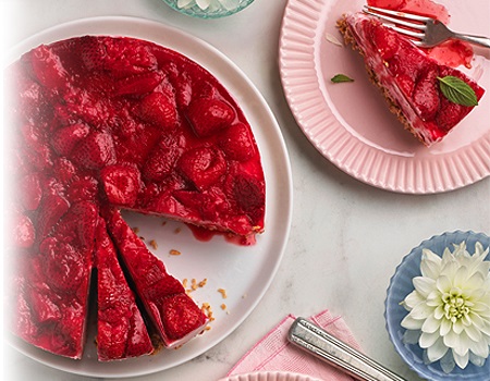 _*Frozen Strawberry Maple Dessert*_ The roasted maple strawberry sauce is not only delicious in this make-ahead creamy, frozen dessert but also drizzled on many breakfast items or desserts. Baking Time: /28 minutes, Chilling Time: 1 hour, Freezing Time: 6 hours/ Preparation Time: /25 minutes/ Serves: /12/ _Ingredients_ 6 cups (1.5 L) Strawberries, quartered (halved if small) 1/2 cup (125 mL) Maple Syrup 1 pkg (200 g) sweetened shredded coconut 3 tbsp (45 mL) butter, melted 1 cup (250 mL) 35% Whipping Cream 2 tbsp (25 mL) icing sugar 1 tsp (5 mL) vanilla 1 pkg (250 g) block light cream cheese, at room temperature 1 tsp (5 mL) each lemon rind and fresh lemon juice 1/3 cup (75 mL) chopped toasted walnuts (optional) _Instructions_ Place strawberries on parchment paper-lined rimmed baking sheet; drizzle with 1/3 cup (75 mL) of the maple syrup. Bake in 425°F (220°C) oven for 15 minutes until juices are bubbling. Scrape into medium bowl; refrigerate 1 hour or until completely cooled. Meanwhile, line bottom of 9-inch (23 cm) springform pan with parchment paper. In medium bowl, combine coconut and butter; press fi rmly into bottom of prepared pan. Bake in 350°F (180°C) oven until golden, about 13 minutes. Cool completely. In large chilled bowl, using electric mixer, whip cream until fluffy. Add icing sugar and vanilla; beat until stiff peaks form. Using the same beaters and in another large bowl, beat cream cheese, lemon rind and juice and remaining maple syrup, until smooth. Beat in 1-1/2 cups (375 mL) of the cooled strawberries until combined. Stir in walnuts (if using). Stir in whipped cream until combined. Spread over cooled crust. Spoon remaining strawberries over top. Cover and freeze 6 hours or until fi rm. Slice into wedges and serve. Or, freeze up to 1 week; before serving, place in refrigerator to soften, about 5 hours. _Nutritional information_ PROTEIN: 3 grams FAT: 16 grams CARBOHYDRATE: 25 grams CALORIES: 253 FIBRE: 2 grams SODIUM: 130 mg