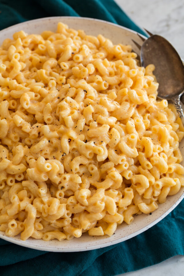 _*Instant Pot Mac and Cheese*_ /Instant Pot Mac and Cheese – the easiest homemade mac and cheese you’ll ever make! It starts with just a handful of ingredients yet it’s luxuriously rich and creamy and decadently cheesy!/   #Butter #CheddarCheese #ChickenBroth #GruyereCheese #HalfAndHalf #Pasta  Servings: 4 Ready in: 30 minutes Prep: 10 minutes Cook: 20 minutes  Ingredients:  267 ml water 430ml low-sodium chicken broth 8 oz. dry elbow macaroni pasta (recommend Barilla for consistent results) Salt and freshly ground black pepper 0.25 cup half and half, heated until just warm, plus more to thin as needed 1.5 Tbsp unsalted butter, diced into 1 Tbsp pieces 4 oz. (2 cup) shredded sharp cheddar cheese* 2 oz. (1 cup) shredded gruyere cheese (recommend Murray's)  Instructions: *1.* Pour water and chicken broth into Instant Pot. Add pasta, season with salt to taste and stir.  *2.* Cover securely with lid, set valve to sealing position. Set to manual pressure and 3 minutes. It will take about 10 minutes to come to pressure then time will start to count down.  *3.* Once time is up, turn instant pot off and carefully do a quick release (stand back it will steam intensely!). Once steaming has stopped completely and there's not pressure remaining remove lid.  *4.* Add butter and pour in half and half. Gently toss until butter has melted.  *5.* Add cheese and stir. Let it rest for 1 minute then toss until cheese has melted (if needed you can set Instant Pot to saute mode just briefly to help melt cheese). If needed thin with more half and half (it doesn't need to be warm).  *6.* Serve warm with pepper if desired. Let cool slightly to thicken if needed.   Notes: Only use freshly grated cheeses, pre-grated cheeses are coated with starches and won't melt smoothly. They don't taste as good either. Optionally you can top servings with toasted panko breadcrumbs. Prepare while macaroni is cooking. Melt 1 - 2 Tbsp butter in a 10-inch skillet over medium-high heat. Add panko and spread even, let toast, tossing frequently until golden brown. Pour into a bowl so it doesn't continue to brown and set aside until ready to use.