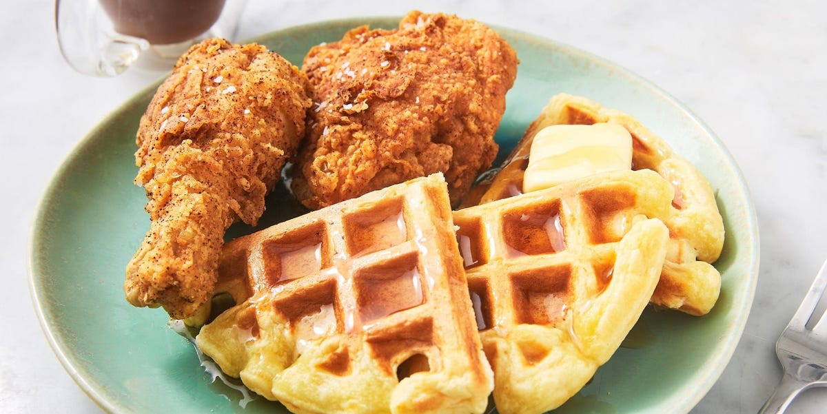 _*Chicken & Waffles*_ /Making fried chicken and waffles at the same time is quite a feat, but this soul food staple is worth the effort. Our classic recipe perfects each component: soft and fluffy waffles pair with extra-crispy fried chicken for the perfect sweet-salty bite. We’ve got all of our top tips here to not only perfect this Southern recipe, but to make it as easy as possible. Let brunch begin!/  How to make the best chicken & waffles: /— The fried chicken. This recipe takes a page from our classic fried chicken recipe, but uses some shortcuts to make it slightly easier. If you’re looking for our ultimate fried chicken (or can’t resist some pickle flavor), checkout our best-ever recipe. Looking to truly upgrade the chicken? Checkout our waffle batter fried chicken./ /— The waffles. Our homemade waffles here are perfectly fluffy, and couldn’t be easier to whip up. Use our recipe here, or feel free to reference our best-ever homemade waffle recipe, buttermilk waffle recipe, or cornbread waffles./  Serving chicken & waffles: /We suggest plating your waffles with a pat of butter, then adding 2-3 pieces of fried chicken on top. Serve with maple syrup and hot sauce, then feel free to add some sides for brunch perfection. Cheesy grits, mimosas, and crispy bacon are always a great idea./  Make it ahead: /Brining your chicken beforehand is NOT required! Sure, it'll make your chicken taste even better, but we understand if spending 3+ hours on brunch isn't really up your alley. We think the best course of action is as follows: get your chicken in a buttermilk brine, whip up your waffles and pop 'em in a 200° oven to stay warm. THEN take out your chicken, bread, and fry./  /Made these? Let us know how it went in the comment section below!/   #Waffles #Southern #Brunch #FriedChicken #WaffleBatterFriedChicken #HomemadeWaffle #ButtermilkWaffle #CornbreadWaffles #CheesyGrits #Mimosas #Bacon  SERVINGS: 4 serving(s). PREP TIME: 15 mins. TOTAL TIME: 3 hrs 15 mins.  Ingredients: 1: 1 qt. buttermilk. 2: 2 tbsp. kosher salt. 3: Mix of bone-in chicken thighs, breasts, and drumsticks (about 2 lbs.). 4: Vegetable oil, for frying. 5: 2 c. all purpose flour. 6: 1 tbsp. paprika. 7: 1 tsp. cayenne. 8: Kosher salt. 9: Freshly ground black pepper. 10: 2 Large eggs. 11: 2 c. all-purpose flour. 12: 2 tbsp. granulated sugar. 13: 1 tsp. baking powder. 14: 1/2 tsp. baking soda. 15: 1 c. sour cream. 16: 1 c. milk. 17: 6 tbsp. butter, melted, plus more for waffle iron. 18: 3 Large eggs, separated.  Directions: 1: Brine chicken: In a large bowl, mix together buttermilk and 2 tablespoons salt. Add chicken and cover bowl with plastic wrap. Refrigerate at least 2 hours and up to overnight. 2: Meanwhile, make waffles: Preheat oven to 200°. In a large bowl, whisk together flour, sugar, baking powder, baking soda, and a pinch of kosher salt. 3: In a separate bowl, whisk together sour cream, milk, butter and egg yolks. Gently fold wet mixture into dry mixture. 4: In a large bowl, using a hand mixer (or in the bowl of a stand mixer), beat egg whites until stiff peaks form. Fold whipped egg whites into batter, being careful not to over mix.  (A few fluffy streaks of whites are fine!) . 5: Heat waffle iron according to manufacturer’s instruction. When the iron is hot, brush grates with melted butter. Spoon about ⅓ cup of batter into waffle maker and cook until golden, about 5 minutes. Repeat with remaining batter. Place cooked waffles in a clean kitchen towel on a baking sheet. Place in oven to keep warm while preparing chicken. 6: When ready to fry: Fill a Dutch oven fitted with a candy thermometer with vegetable oil until 2" to 3" deep, then preheat until oil reaches 350º. Prepare one sheet pan lined with paper towels and a wire rack. 7: Transfer chicken from brine to another sheet pan and dry thoroughly with paper towels. Season generously with salt and pepper. 8: In a large, deep bowl, whisk together flour, paprika, cayenne, salt, and pepper. In a large bowl, beat eggs with 2 tablespoons water. Using tongs, place chicken in egg mixture, roll in flour mixture, and shake off excess. Fry chicken in 2 batches until golden brown and cooked through, 6 to 8 minutes (internal temperature should read 165º). Bring oil back to 350º before adding last batch. 9: Place chicken on wire rack and season with salt immediately. Plate waffles with a pat of butter and top with 2 to 3 pieces of fried chicken. Serve with maple syrup on the side for drizzling. 