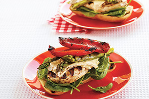 _*Open-Faced Grilled Chicken, Asparagus and Red Pepper Sandwiches*_ /One of the nicest ways to enjoy fresh asparagus is grilled. Layer it on a toasted bun with grilled chicken, Brie, red pepper and salad greens./   #CalendarRecipe #Lunch  Servings: 4 Grilling Time: 10 to 15 minutes Preparation Time: 15 minutes  Ingredients:  3 tbsp (45 mL) olive oil 1 clove garlic, minced 1/2 tsp (2 mL) dried oregano leaves Pinch each salt and pepper 1 tsp (5 mL) balsamic vinegar 2 boneless skinless Ontario Chicken Breasts 12 Ontario Asparagus Spears 1 large Ontario Greenhouse Sweet Red Pepper, quartered   2 crusty buns (such as ciabattas) 2 cups (500 mL) mixed Ontario Salad Greens or Baby Spinach Leaves 4 oz (125 g) Ontario Brie Cheese, sliced  Instructions: *1.* In small bowl, combine oil, garlic, oregano, salt and pepper; divide in half.  To one half, stir in vinegar. Set aside.  *2.* Holding knife blade horizontally, cut chicken breasts in half to make 4 pieces. Brush with some of the oil mixture.   Trim asparagus to length of buns. Toss asparagus with some of the oil mixture.  *3.* Slice buns horizontally and place on grill over medium heat; grill until toasted, about 2 minutes. Set aside. Add chicken, asparagus and red pepper to grill; grill over medium heat until chicken is no longer pink and vegetables are tender, 10 to 13 minutes, removing as they are done.  *4.* Toss greens with vinegar mixture.  *5.* To assemble sandwiches, place greens on bun half. Top with chicken, Brie, asparagus and red pepper.  *6.* Tip: For easy slicing freeze Brie for 15 minutes or until firm.