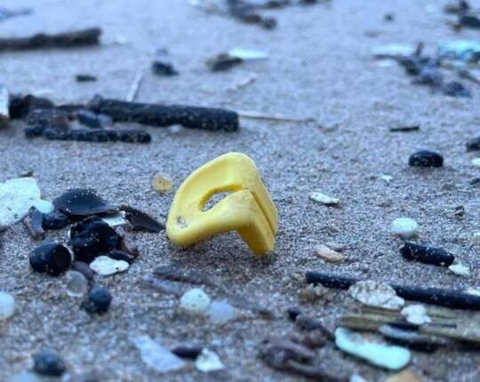 Pieces are still washing ashore from the Great Lego spill in 1997. This latest one from last week is a little life jacket piece.  In February 1997, the cargo ship Tokio Express was struck by a massive wave off the coast of Cornwall, sending 62 containers overboard. One of those containers carried nearly 5 million Lego pieces, many of them ocean-themed, like scuba tanks, flippers, octopuses, and tiny life jackets.  Nearly three decades later, these Lego relics are still washing ashore. Just last week, a small yellow life jacket piece appeared on a Cornish beach, a colorful survivor of the storm.  Fun facts: about 3 million of the spilled pieces were light enough to float, allowing them to drift across oceans. Collectors now track sightings of the lost Lego, and scientists use the spill to study how plastics travel on currents. Some pieces have even been found tangled in seaweed or resting on the seabed.  The Great Lego Spill has become part of maritime folklore, a quirky story of toys turned time capsules, but also a lasting reminder of how durable plastic remains in our environment. 