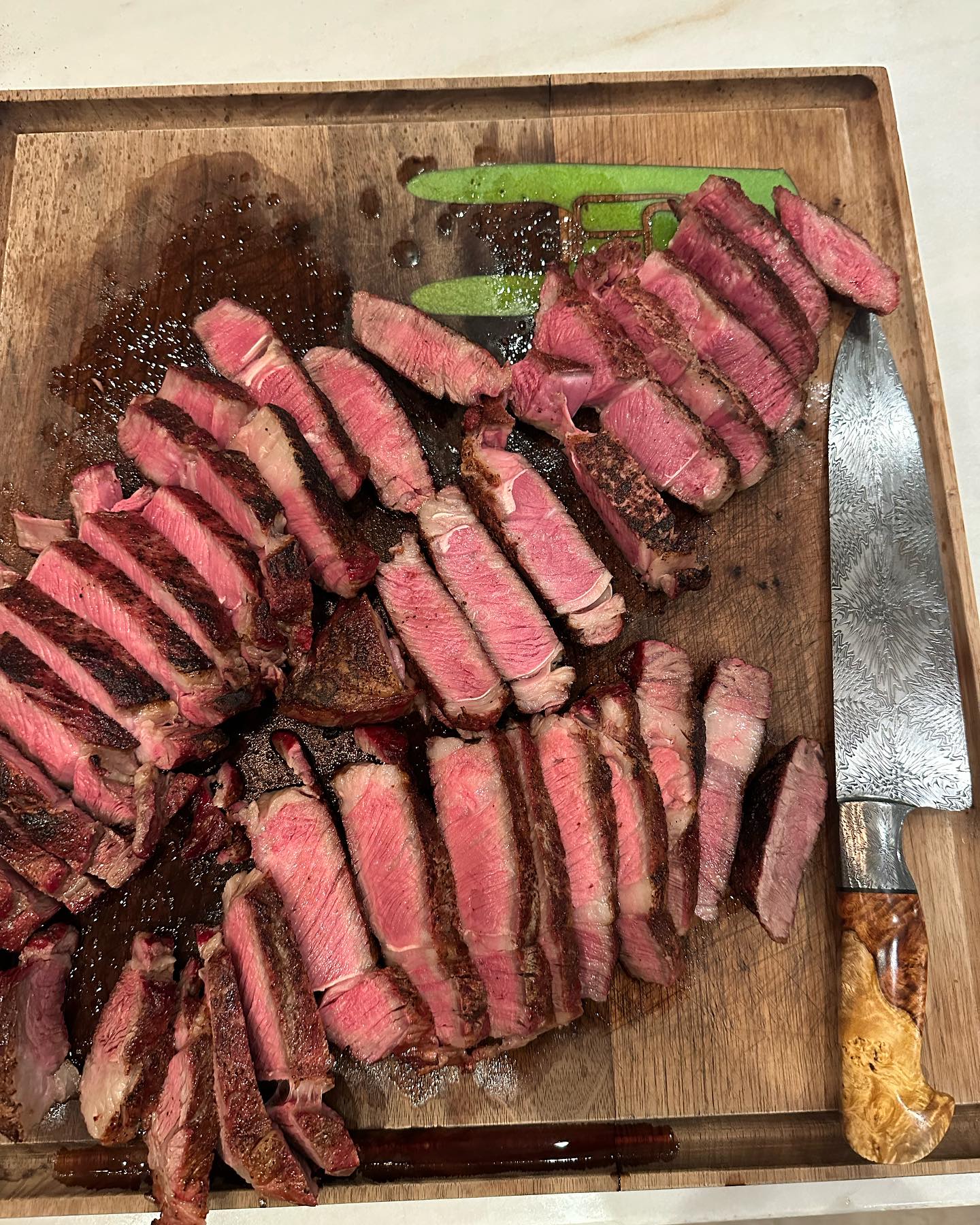 Reverse seared ribeyes, and a gorgeous chef’s knife by @wilburnforge. Pictures don’t do the pattern on this blade justice. Just an incredible piece of functional art!<br> @joerogan