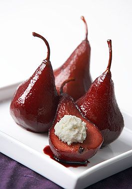 Red Wine Poached Pear  with Goat Cheese
Have you ever seen pears look so stunning? Poached in red wine and topped for goat cheese, you are in for a real culinary experience.

http://ontariogoatcheese.ca/recipes/red-wine-poached-pear-with-goat-cheese/