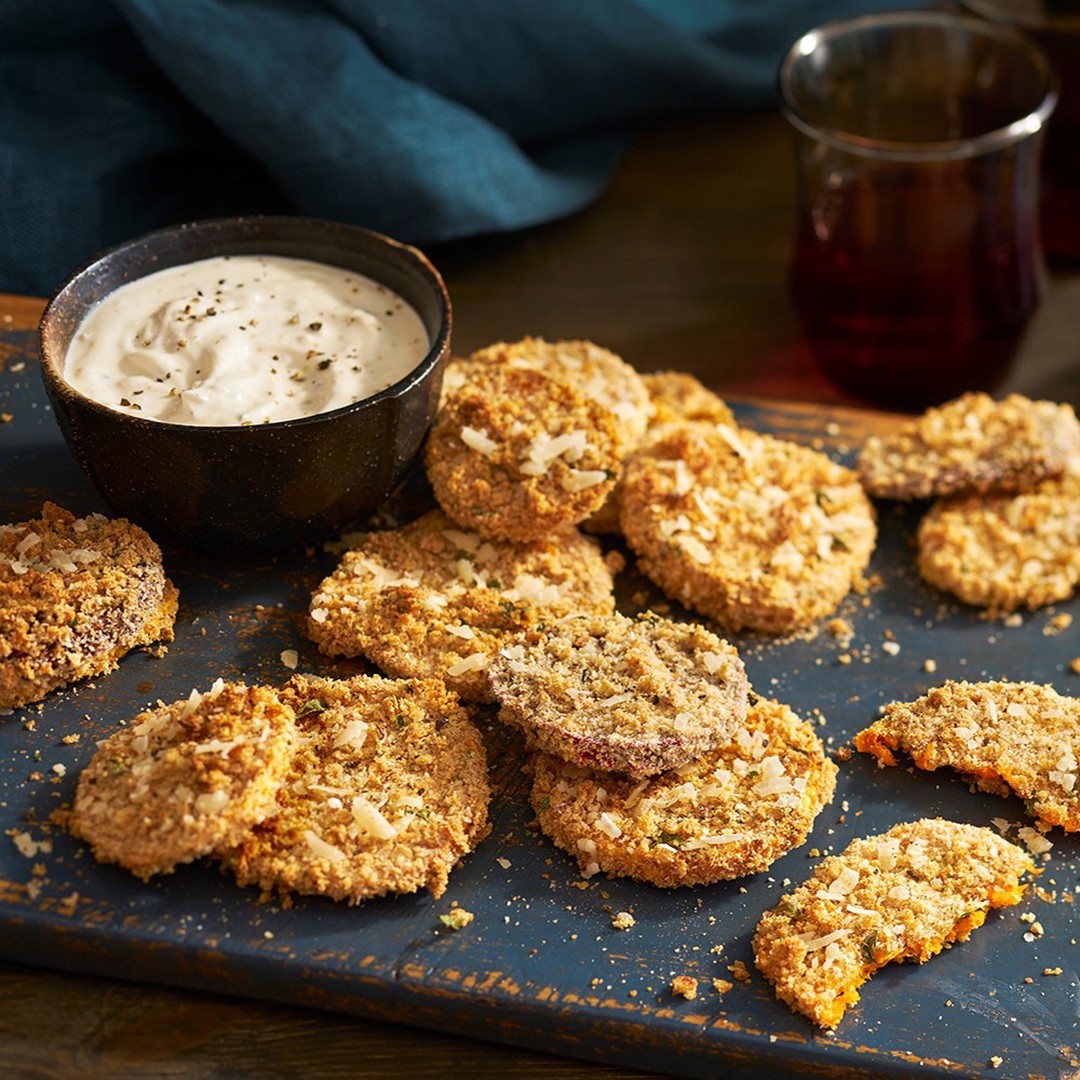 Looking for an easy way to eat more Ontario veggies? Look no further than these Crispy Root Veggie Rounds! Served with creamy garlic dip, these yummy snacks are sure to satisfy. Find the recipe link in our bio. #loveONTfoodfoodlandontario