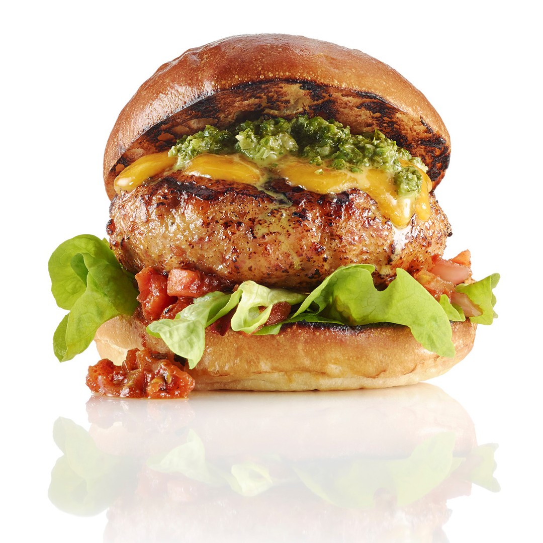 These oh-so-flavourful Chicken and Chorizo burgers get their fresh crunch thanks to Ontario Greenhouse Lettuce. Find the recipe link in our bio. What are your must-have toppings on your burger? #loveONTfood #burgersfoodlandontario