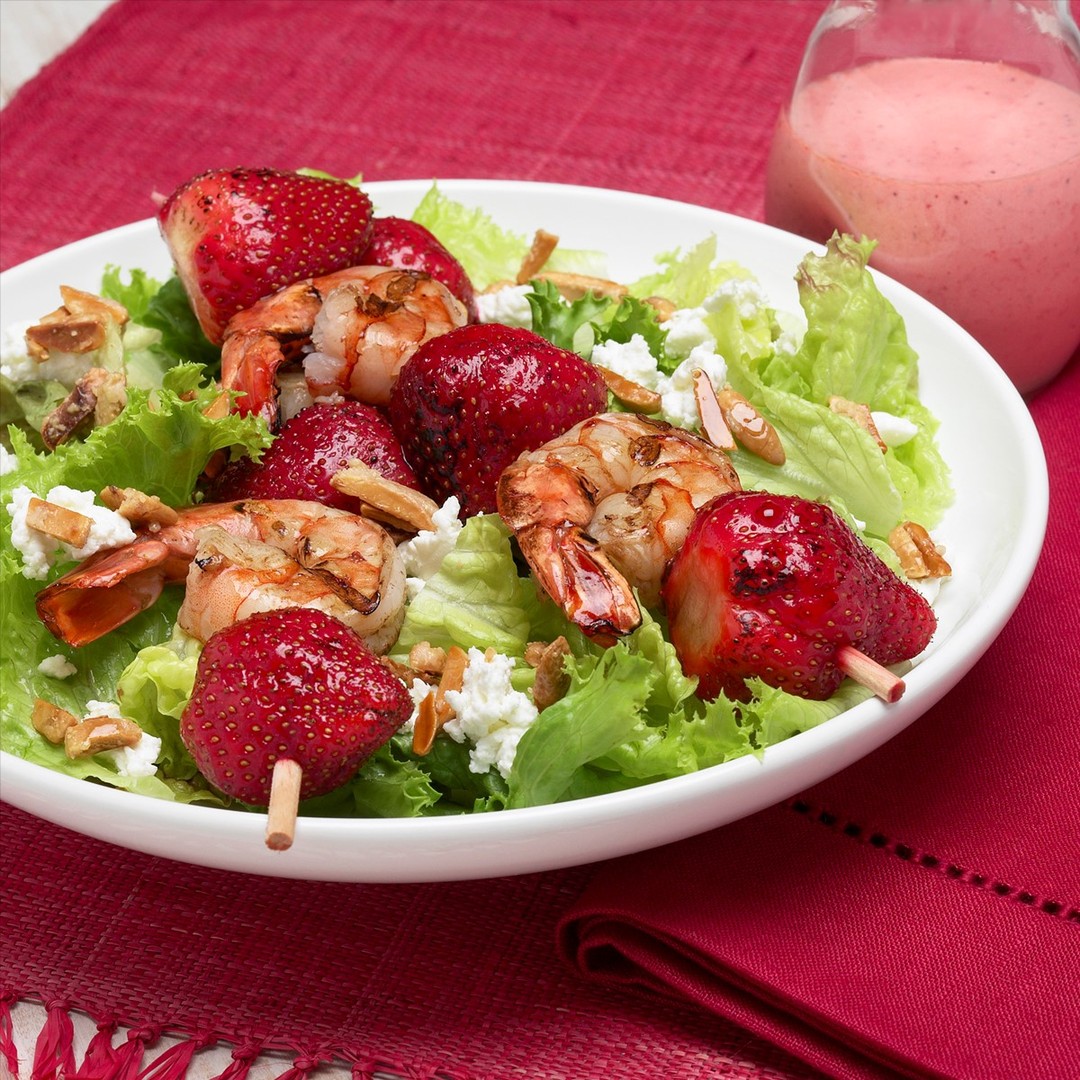 Hot Summer days call for light refreshing salads. Try this mouthwatering combo of crisp lettuce, tender shrimp, juicy Ontario strawberries, and goat cheese. Yum! Find the recipe link in our bio. #SummerSalads #loveONTfoodfoodlandontario