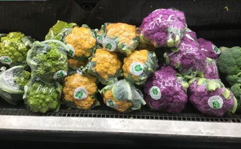 Green, Orange and Purple Cauliflower with the Foodland Ontario logo