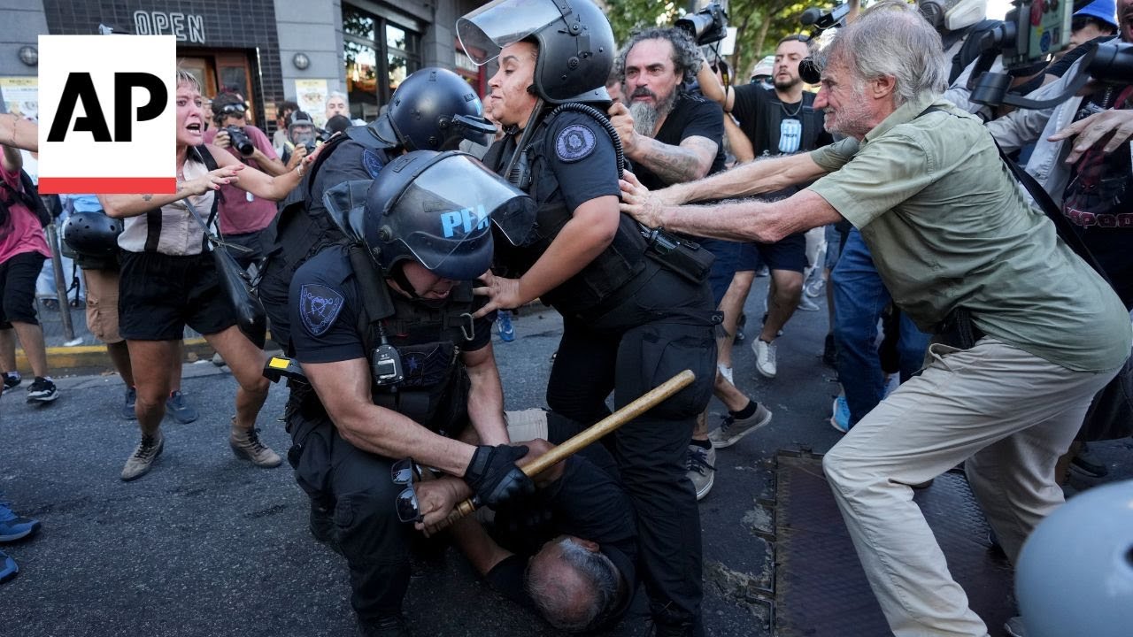 Protesters clashed with police in Buenos Aires as they tried to march around the Argentine Congress to demand higher pensions and against austerity measures ...